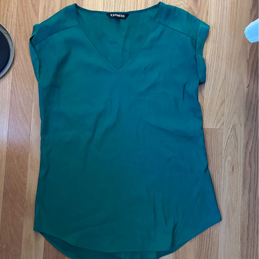 Green satin v-neck top.